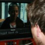 Checking the shot on the monitor.